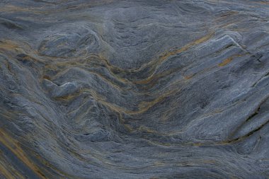 Taşın soyut doğal arka planı ve tuhaf bir dokusu var. 