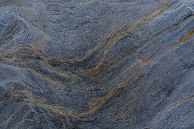 Taşın soyut doğal arka planı ve tuhaf bir dokusu var. 