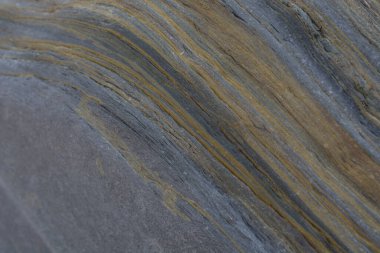 Taşın soyut doğal arka planı ve tuhaf bir dokusu var. 