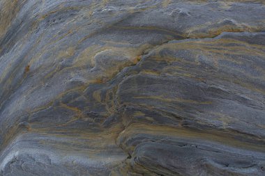 Taşın soyut doğal arka planı ve tuhaf bir dokusu var. 