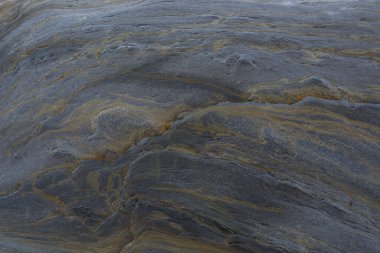 Taşın soyut doğal arka planı ve tuhaf bir dokusu var. 