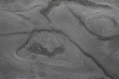 Taşın soyut doğal arka planı ve tuhaf bir dokusu var. 