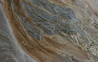 Taşın soyut doğal arka planı ve tuhaf bir dokusu var. 