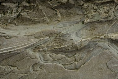 Taşın soyut doğal arka planı ve tuhaf bir dokusu var. 