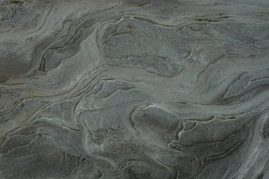 Taşın soyut doğal arka planı ve tuhaf bir dokusu var. 