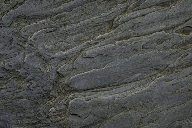 Taşın soyut doğal arka planı ve tuhaf bir dokusu var. 