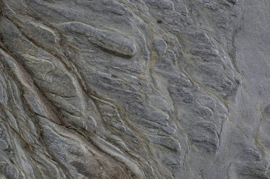 Taşın soyut doğal arka planı ve tuhaf bir dokusu var. 