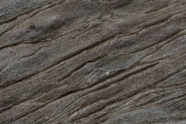 Taşın soyut doğal arka planı ve tuhaf bir dokusu var. 