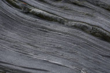 Taşın soyut doğal arka planı ve tuhaf bir dokusu var. 