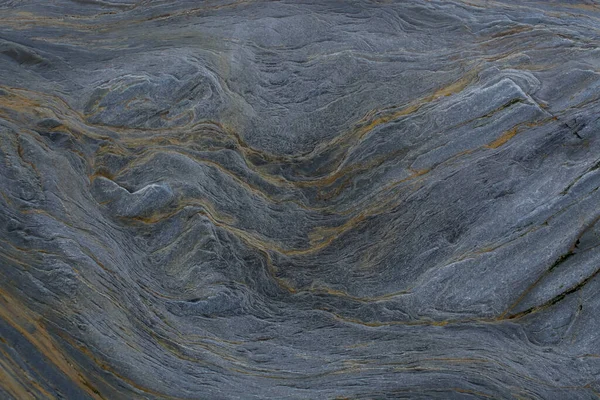 Taşın soyut doğal arka planı ve tuhaf bir dokusu var. 