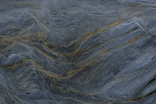 Taşın soyut doğal arka planı ve tuhaf bir dokusu var. 