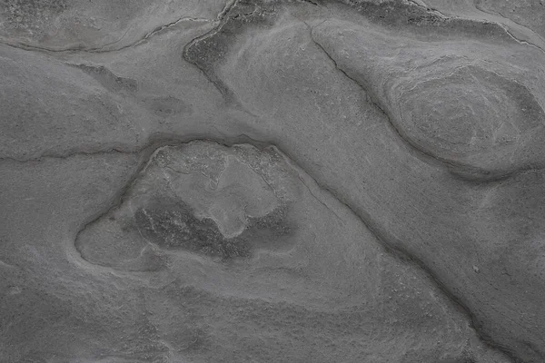 Taşın soyut doğal arka planı ve tuhaf bir dokusu var. 