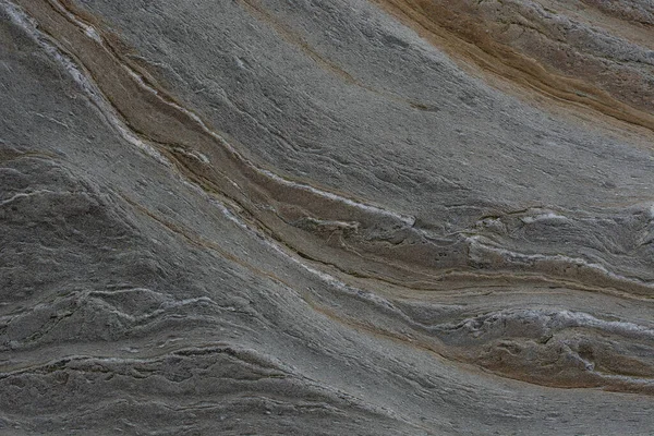 Taşın soyut doğal arka planı ve tuhaf bir dokusu var. 