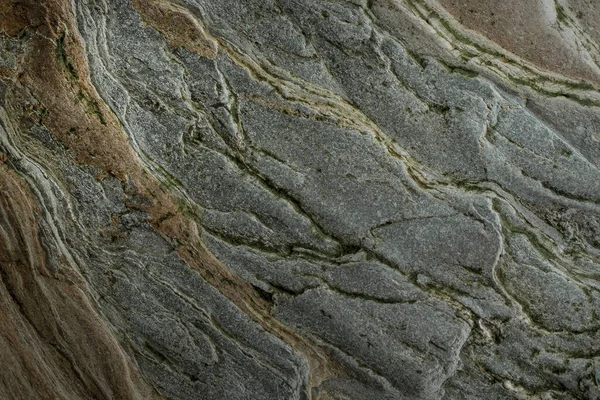 Taşın soyut doğal arka planı ve tuhaf bir dokusu var. 