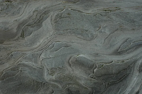 Taşın soyut doğal arka planı ve tuhaf bir dokusu var. 