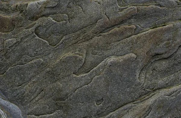 Taşın soyut doğal arka planı ve tuhaf bir dokusu var. 