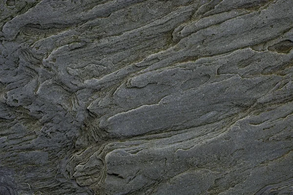 Taşın soyut doğal arka planı ve tuhaf bir dokusu var. 