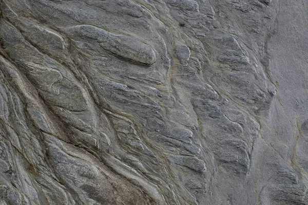Taşın soyut doğal arka planı ve tuhaf bir dokusu var. 