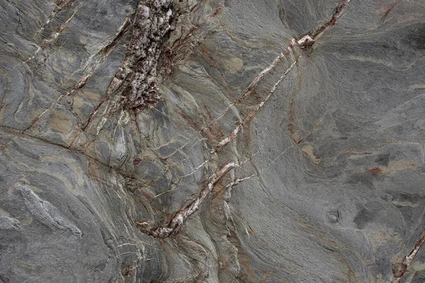 Taşın soyut doğal arka planı ve tuhaf bir dokusu var. 