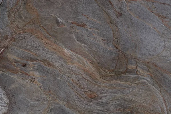 Taşın soyut doğal arka planı ve tuhaf bir dokusu var. 