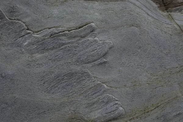 Taşın soyut doğal arka planı ve tuhaf bir dokusu var. 