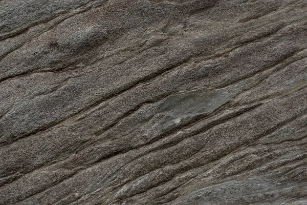 Taşın soyut doğal arka planı ve tuhaf bir dokusu var. 