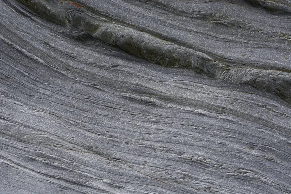 Taşın soyut doğal arka planı ve tuhaf bir dokusu var. 