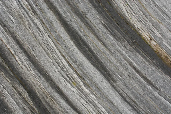 Taşın soyut doğal arka planı ve tuhaf bir dokusu var. 