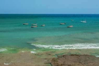 Summer beach, ocean waves on a tropical sea with deep blue wawes