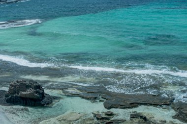 Summer beach, ocean waves on a tropical sea with deep blue wawes