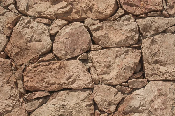 Wall closeup hand construction stones texture