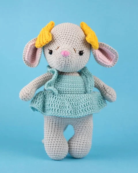A knitted mouse, a handmade toy.