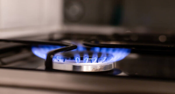 Gas stove. Concept of gas problems in the world.