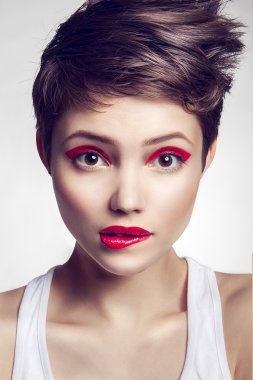 Portrait of beautiful girl with red lips. clipart