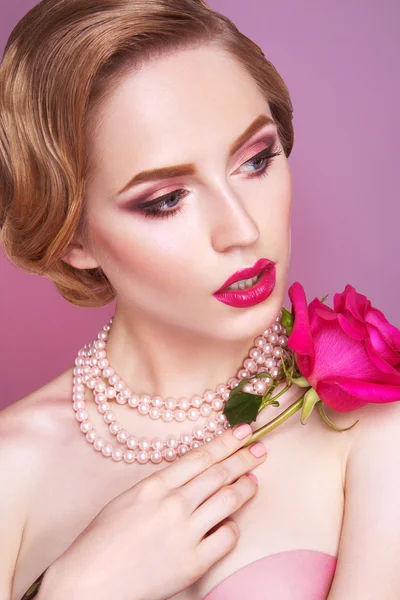 Lady with pink rose. — Stock Photo, Image