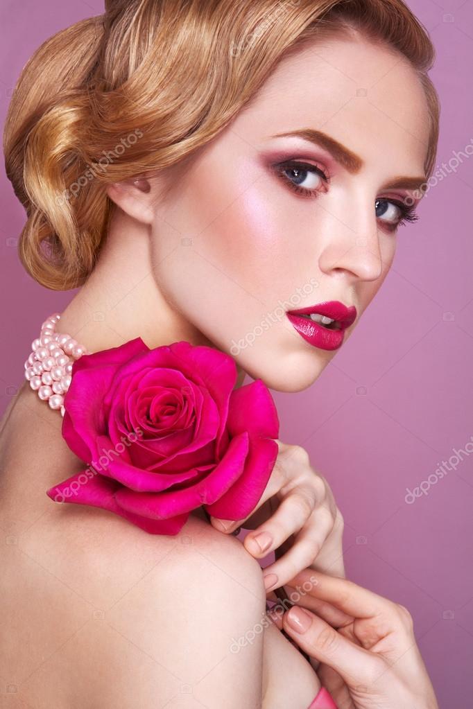 Lady with pink rose. Stock Photo by ©korabkova 50801569