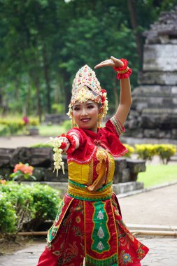 Indonesian dancer with the traditional costume is ready to perform to celebrate the World Dance Day