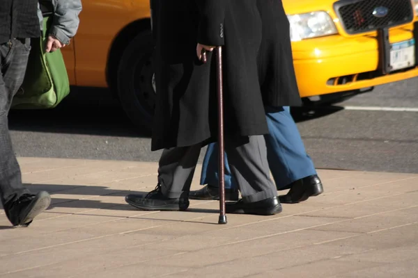 Senior with a cane — Stock Photo, Image
