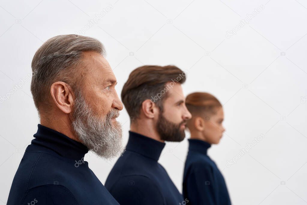 Faces of three generations of Caucasian men