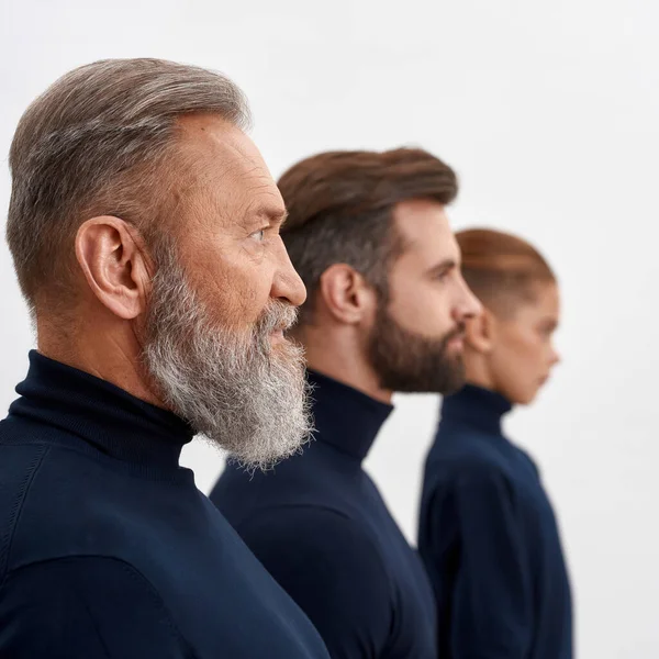 Gewas van drie generaties blanke mannen gezichten — Stockfoto