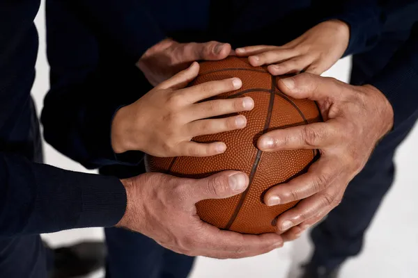 Close up of three male generations play basketball — Stock Photo, Image