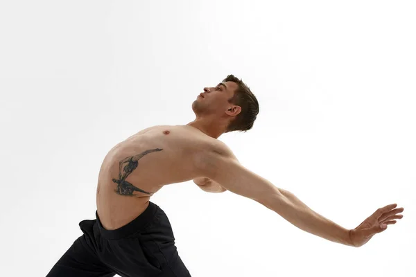 Muž tanec balet na bílém pozadí — Stock fotografie