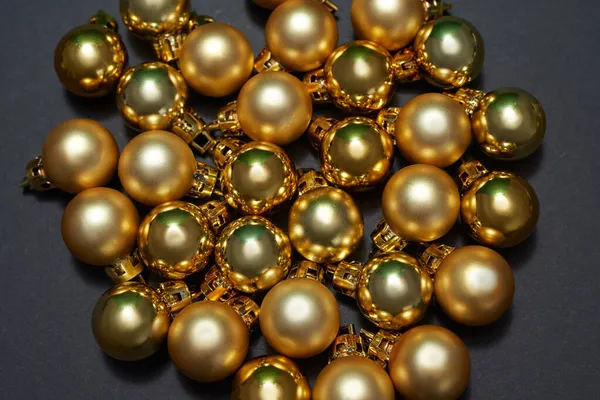 Close up of collection of golden christmas balls — Stock Photo, Image