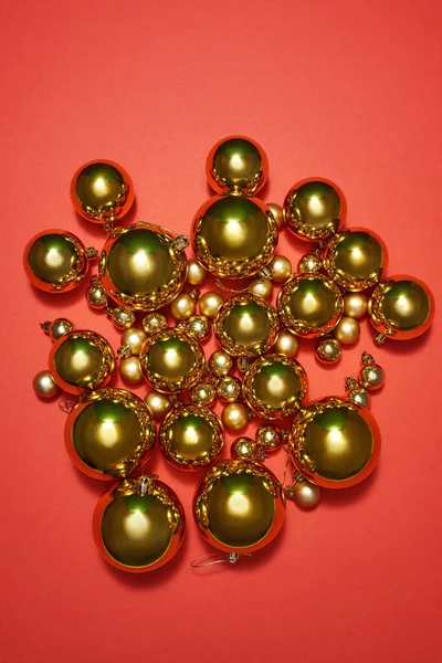 Top view of christmas balls on red background — Stock Photo, Image