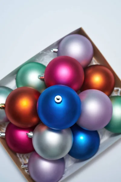Top view of cardboard package with christmas balls — Stock Photo, Image