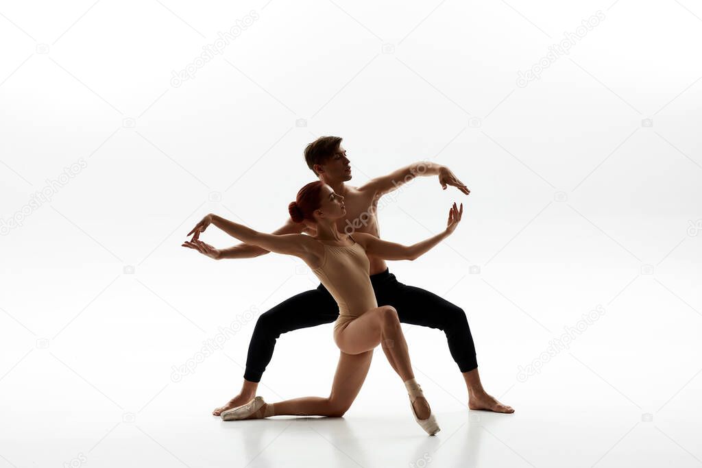 Young caucasian dance couple dancing ballet dance