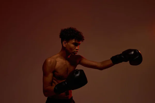 Side view of male boxer boxing during training — Stock Fotó