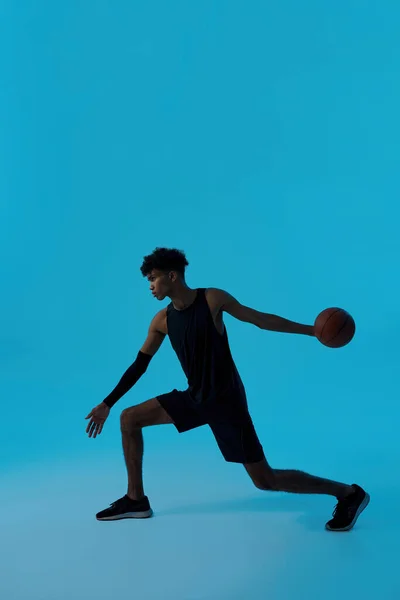 Black focused male player throwing basketball ball — Stock Fotó