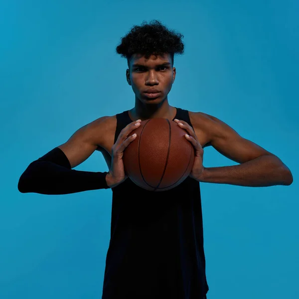 Young black male player hold basketball ball — Stock Fotó