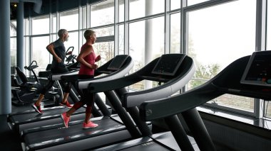 Healthy and fit elderly couple training together